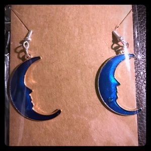 Blue moon shaped earrings with golden outline